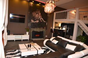 Appartement Loft avec spa privatif : photos des chambres