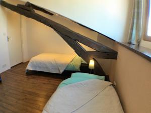 Hebergement Maison Haut De La Colline : photos des chambres