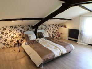 Hebergement Maison Haut De La Colline : photos des chambres