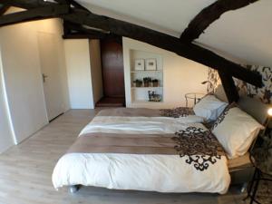 Hebergement Maison Haut De La Colline : photos des chambres