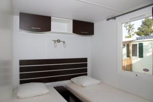 Hebergement Lagrange Grand Bleu Vacances – Camping Le Bosc : photos des chambres