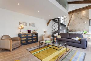 Hebergement Loft cote jardin : photos des chambres
