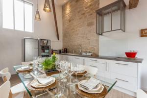 Hebergement Loft cote jardin : photos des chambres
