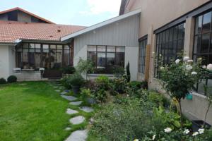 Hebergement Loft cote jardin : photos des chambres