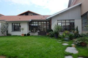 Hebergement Loft cote jardin : photos des chambres