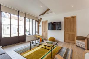 Hebergement Loft cote jardin : photos des chambres