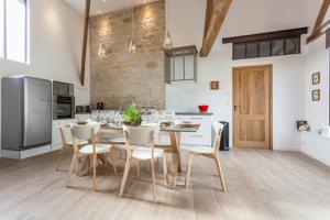Hebergement Loft cote jardin : photos des chambres