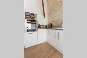 Hebergement Loft cote jardin : photos des chambres