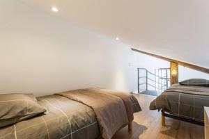 Hebergement Loft cote jardin : photos des chambres