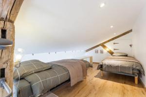 Hebergement Loft cote jardin : photos des chambres