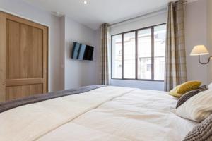 Hebergement Loft cote jardin : photos des chambres