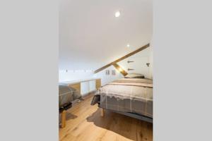 Hebergement Loft cote jardin : photos des chambres
