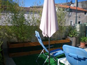 Appartement T2 dans maison de village : photos des chambres