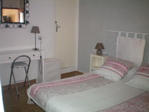 Appartement T2 dans maison de village : photos des chambres