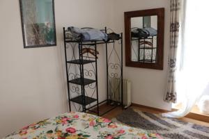 Appartement Gite de Maison d'Angle : photos des chambres