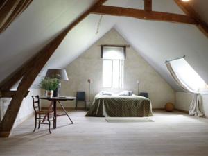 Hebergement Au Bord De L Etang : photos des chambres
