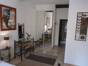 Appartement Maison de la Place : photos des chambres