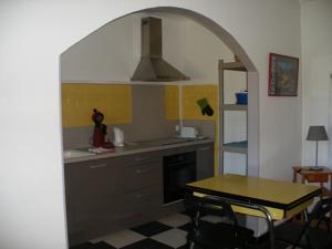 Hebergement Petite Maison de Village : photos des chambres