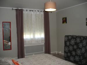 Hebergement Petite Maison de Village : photos des chambres