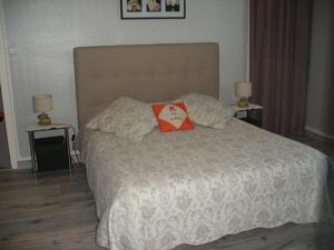 Hebergement Petite Maison de Village : photos des chambres