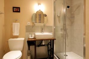Appartement Maison de Textile Apartment : photos des chambres