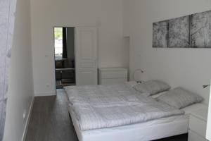 Appartement Le Presbytere : photos des chambres