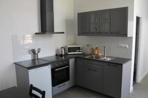 Appartement Le Presbytere : photos des chambres