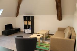 Appartement Le Presbytere : photos des chambres