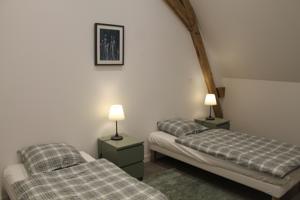 Appartement Le Presbytere : photos des chambres