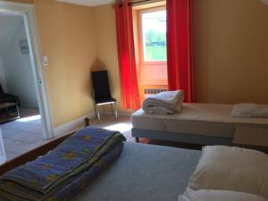 Appartement Dampierre appart : photos des chambres
