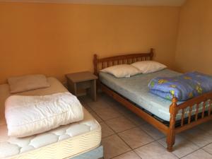 Appartement Dampierre appart : photos des chambres