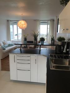 Appartement Vue magnifique sur mer : photos des chambres