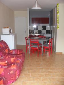 Appartement Le Sporting : photos des chambres