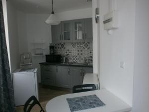 Appartement Le Petit Palais : photos des chambres