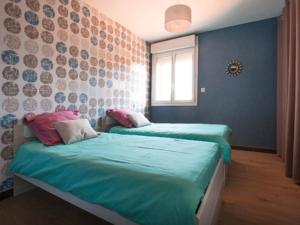 Appartement duplex sous les toits : photos des chambres