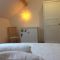 Appartement Apartment thermale luxeuil : photos des chambres