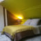 Hebergement 51 cote jardin : photos des chambres