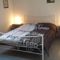 Merlines appartement T2 : photos des chambres