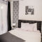 Bel appartement prive proche Paris : photos des chambres