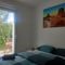 Appartement Chic apart terrasse garden parking : photos des chambres