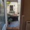 Appartement Au coeur du Bourget, A quelques minutes de Paris : studio en rez de jardin, semi privatif. : photos des chambres