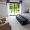 Hebergement Villa ambiance cottage avec piscine et jacuzzi : photos des chambres