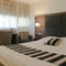 Hotel Kyriad Bordeaux Ouest - Merignac Aeroport : photos des chambres