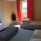 Appartement Dampierre appart : photos des chambres