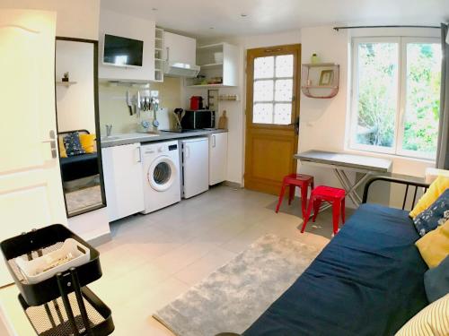 Studio calme proche Paris avec terrasse privative et jacuzzi en option : Appartements proche de Saclay