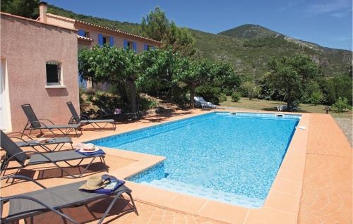 Awesome home in Roquebrun with 4 Bedrooms, WiFi and Outdoor swimming pool : Maisons de vacances proche de Ferrières-Poussarou