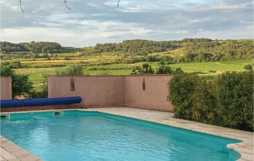 Beautiful home in Cruzy with 4 Bedrooms, WiFi and Outdoor swimming pool : Maisons de vacances proche de Cébazan