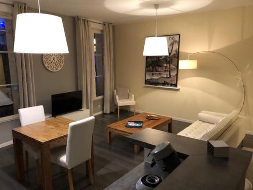 Meublé d'affaires place Dupleix : Appartements proche de Saint-Gervais-les-Trois-Clochers
