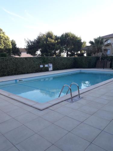 Résidence calme avec piscine : Appartements proche de Boujan-sur-Libron