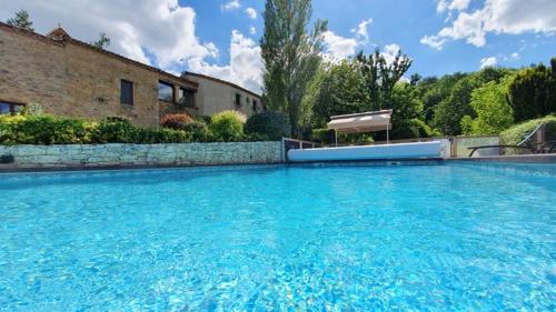 Maison de 4 chambres avec piscine partagee terrasse amenagee et wifi a Puy l'Eveque : Maisons de vacances proche de Pomarède